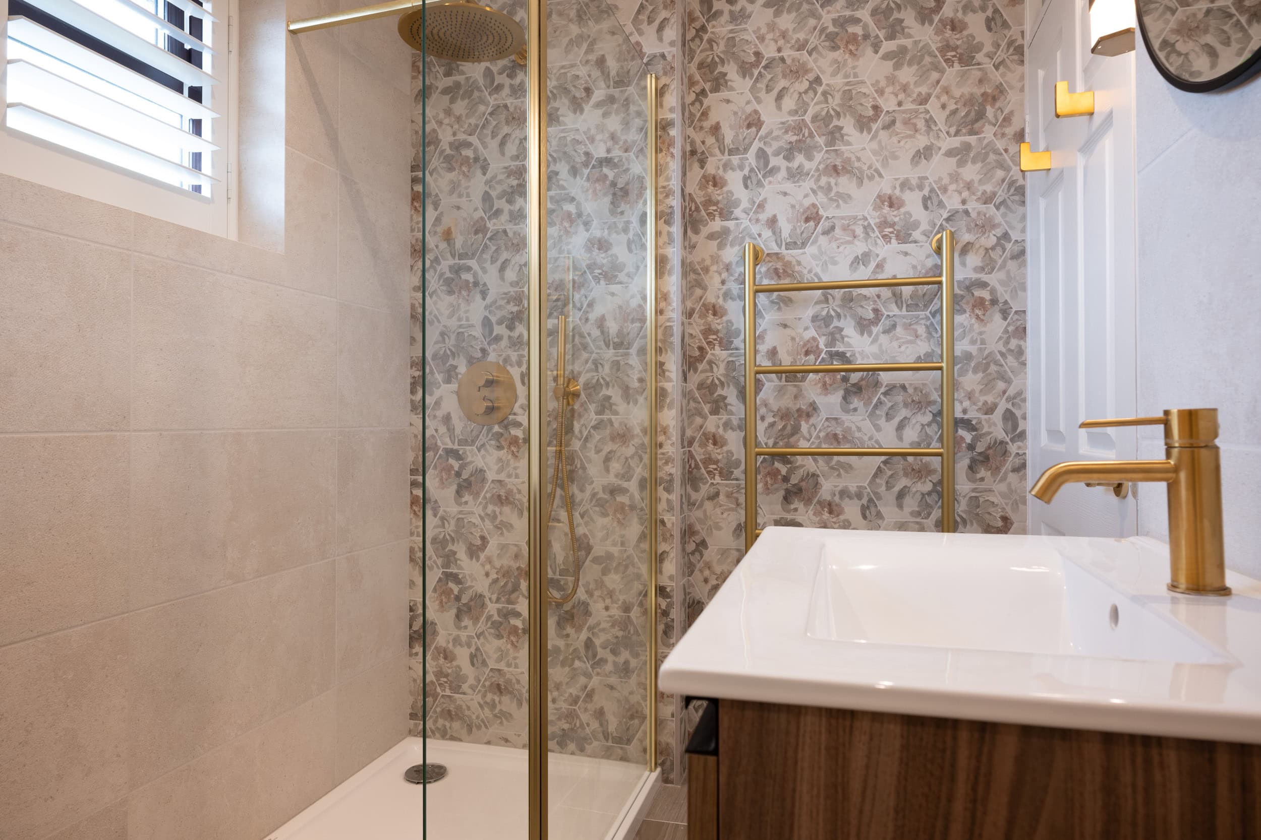 Cheshire bathroom with gold brassware